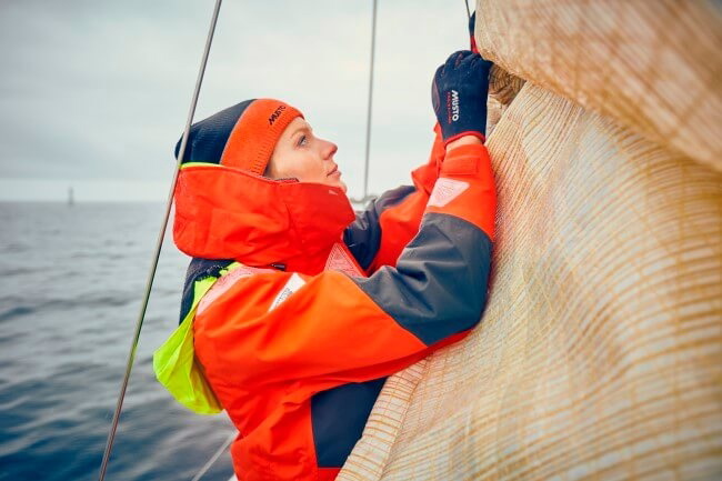 A sailor keeping warm and dry