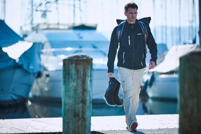 A sailor walking to his boat